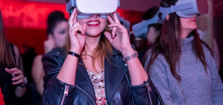 Two women using VR headsets