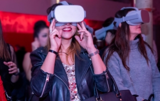 women with VR headset on at experiential marketing event