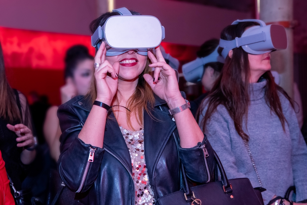 women with VR headset on at experiential marketing event