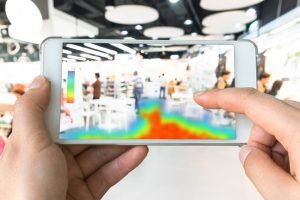 Person using phone to show a heatmap