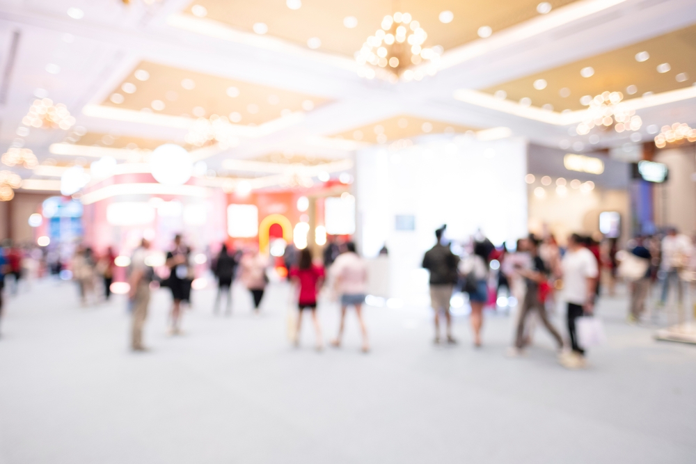 Conference hall showing people milling around